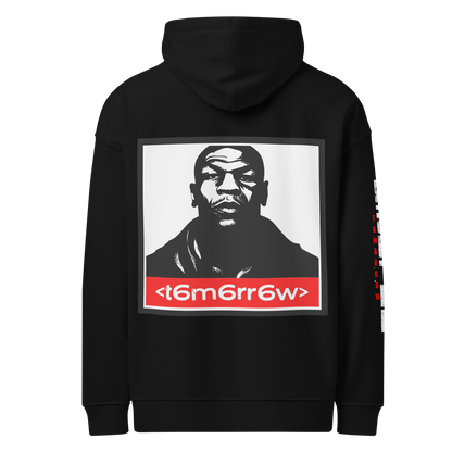 t6m6rr6w Fighter Tyson K.O. Code Premium Hoodie in black organic cotton blend. Front view displays circular t6m6rr6w Boxing badge logo in silver with vintage styling. Back view showcases bold Mike Tyson portrait in black and white with iconic red t6m6rr6w brand banner below. Unisex relaxed fit hoodie with kangaroo pocket, part of Fighter Collection underground streetwear